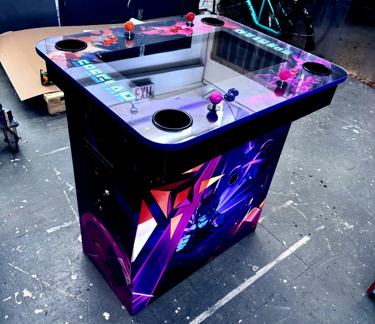 Full view of the Speglar arcade cabinet from above, in a workshop